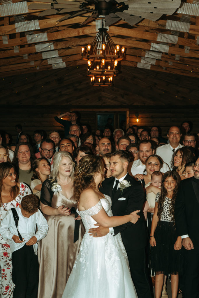 Group photo with guests on wedding day. 