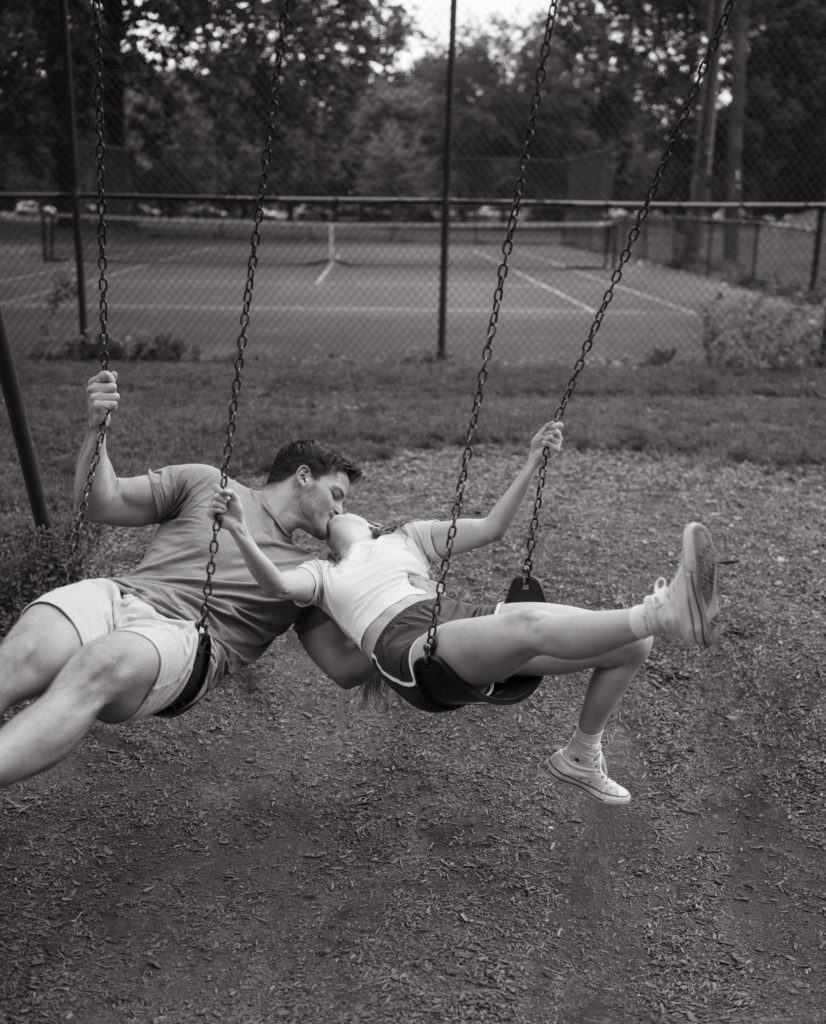 couples photos on a swing